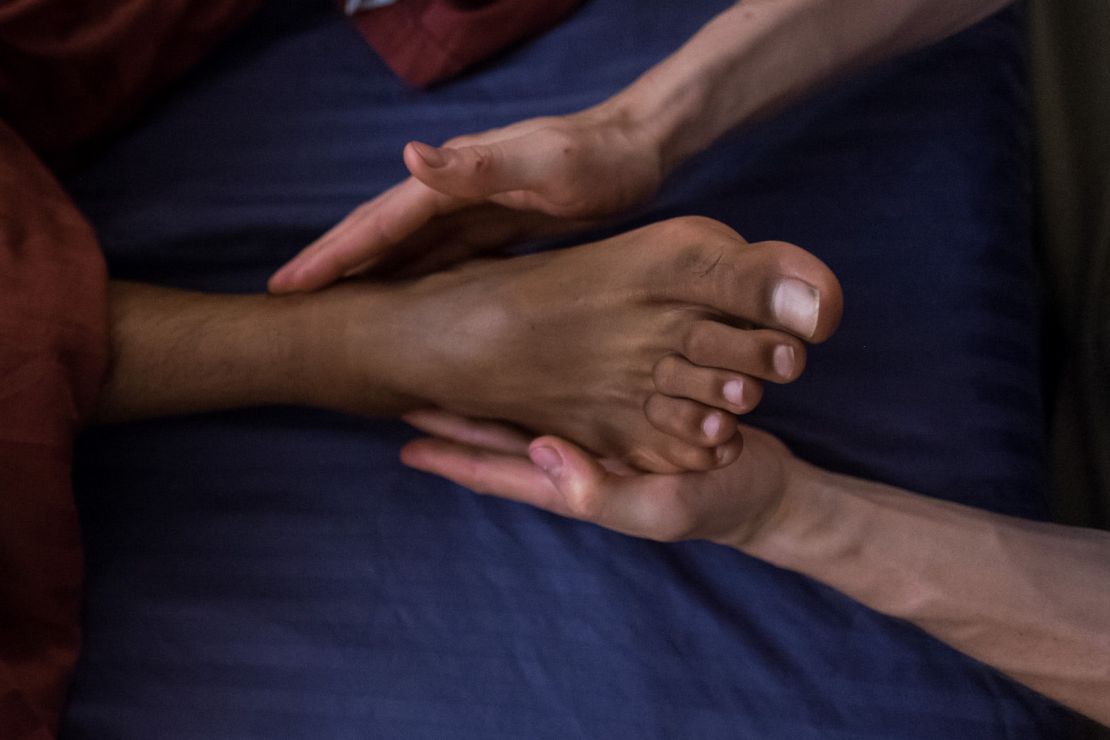 Photo: Hands gently working on a foot
